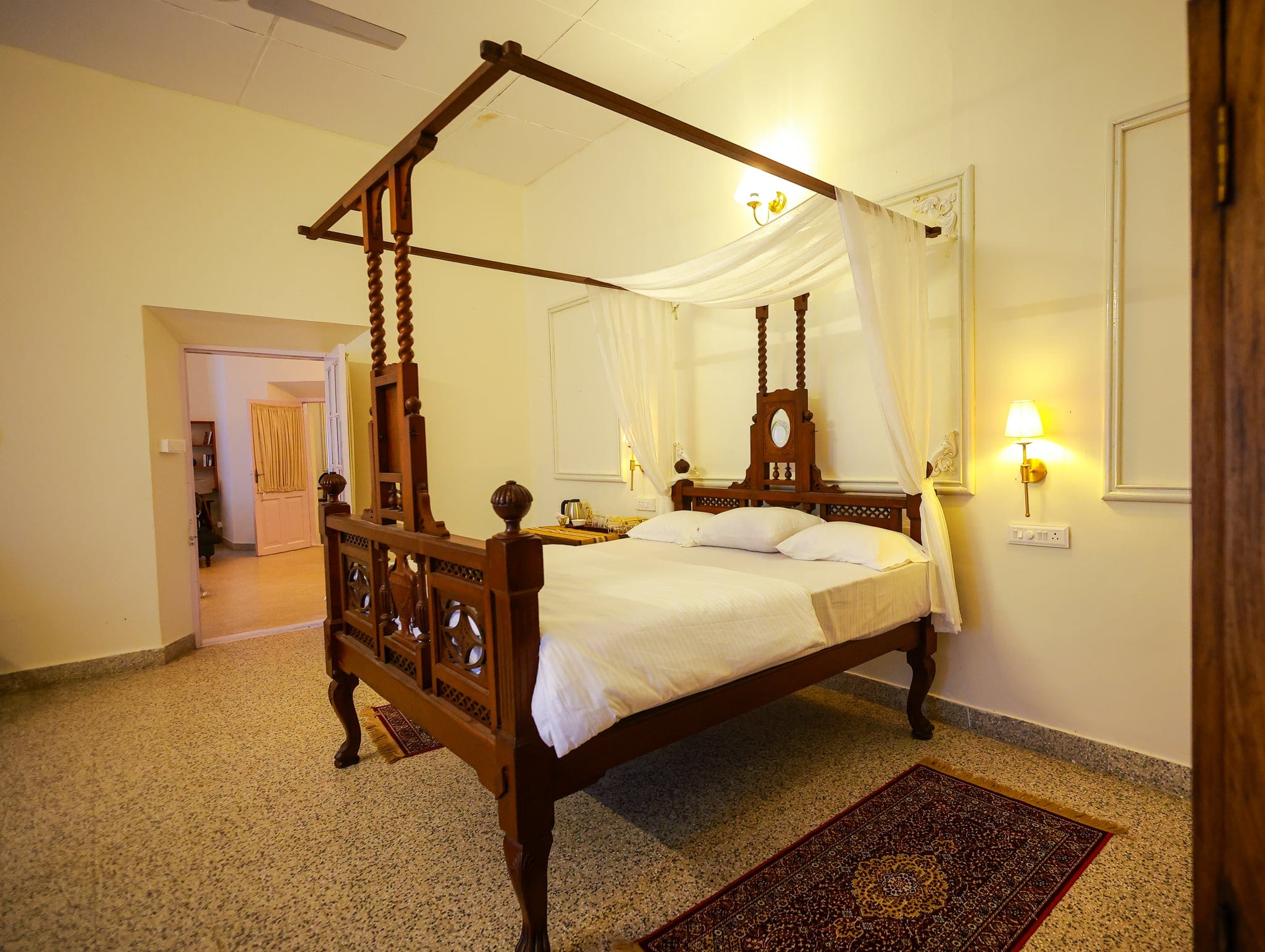 Four-poster bedroom in the 1930s bungalow at Heyday Planter's Portico, near Thenmala, Kollam, Kerala